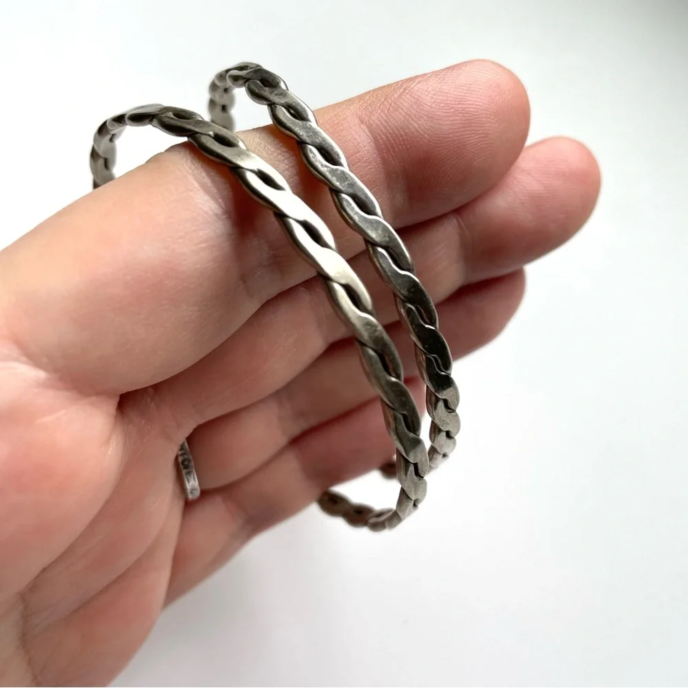 Pair of vintage unmarked sterling? flat twist link Mexico bangle bracelets